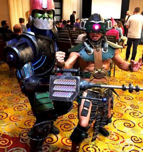 two men wearing military robot costume