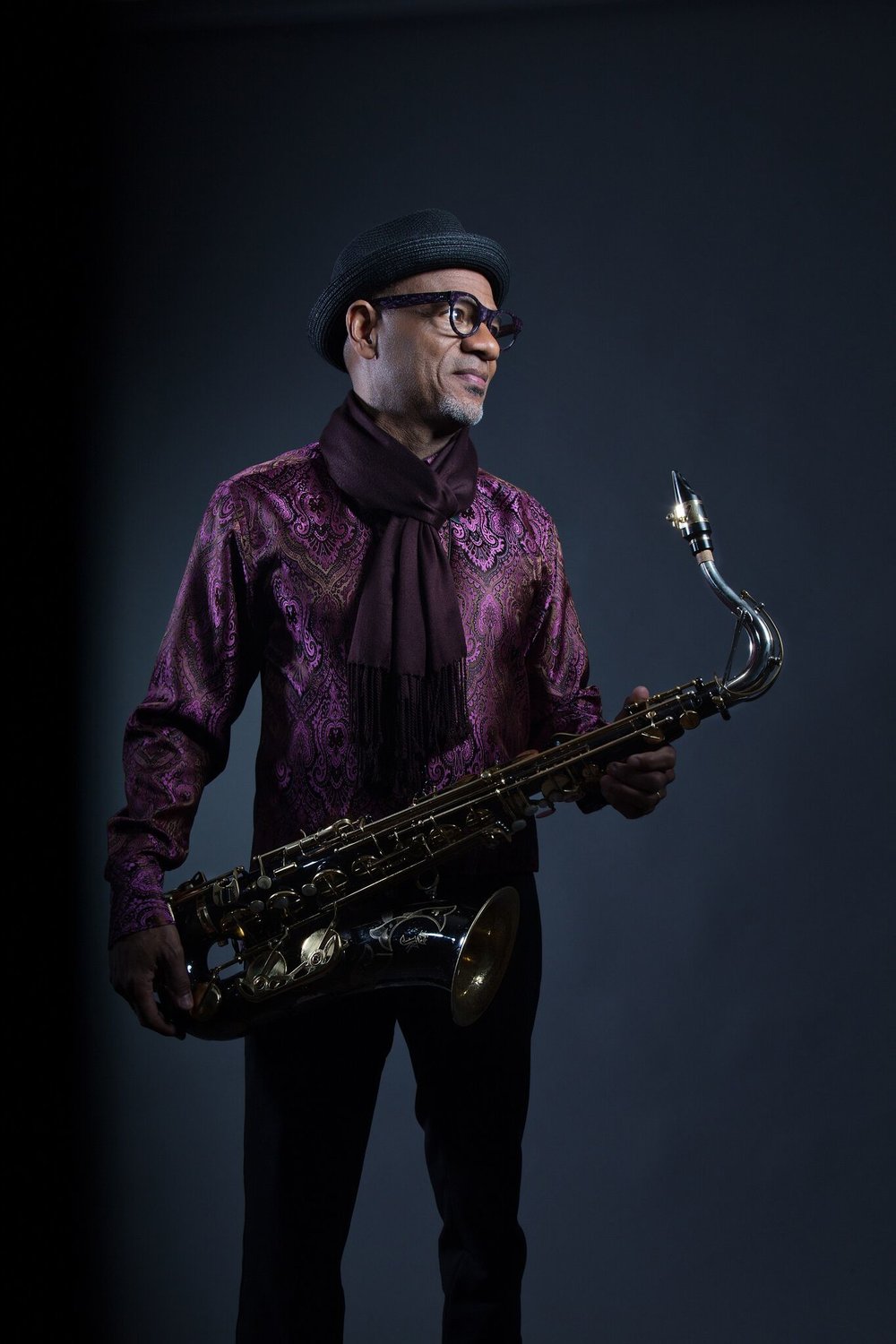 Kirk Whalum holding saxophone