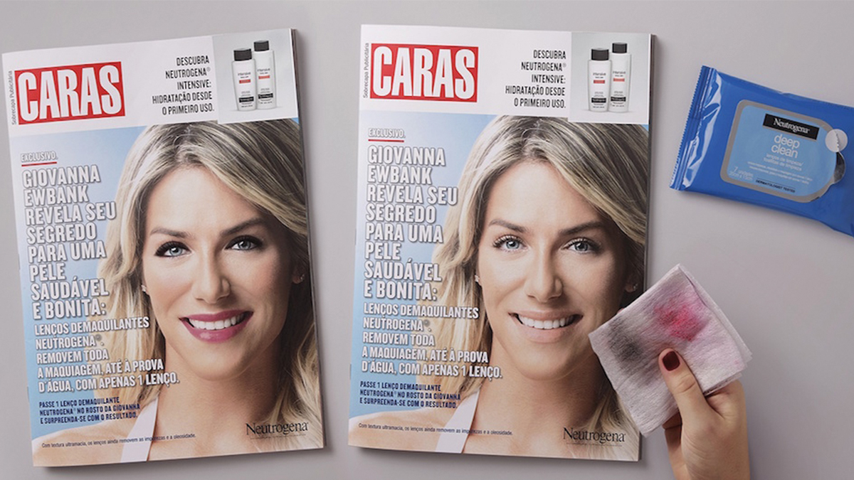 Two magazines that have women images and a woman handling a dirty wipe tissue.