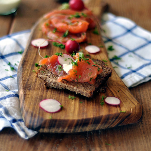 cured salmon served in a wooden tray