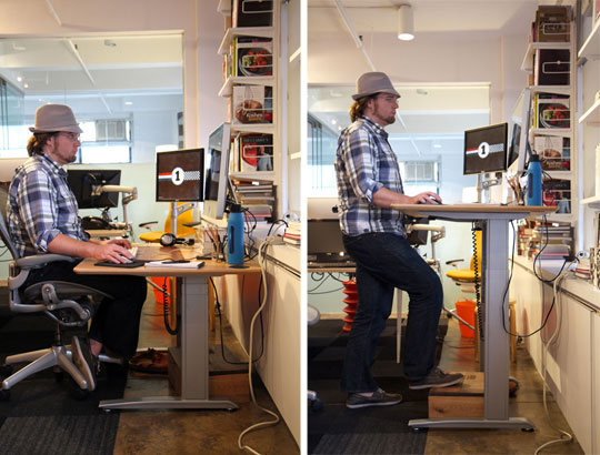 a man is sitting on a desk in front of a computer on the left photo and the same man standing in front of a computer on the right photo