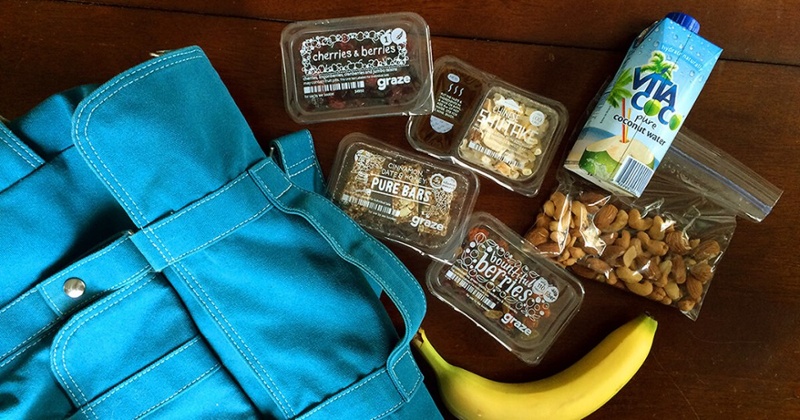 a blue bag and packed snacks