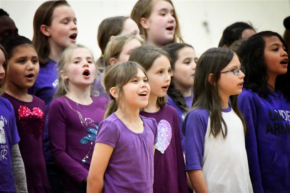 group of young girls singing