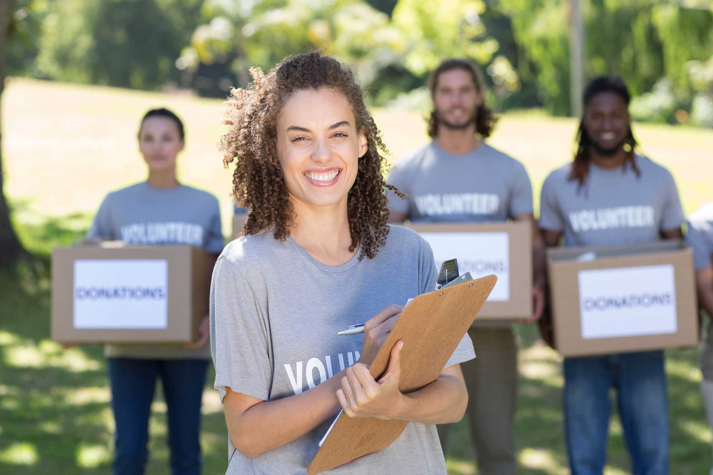 volunteers smiling to the camera