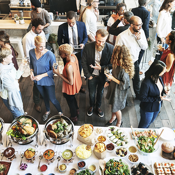 group of people meeting in person in the nonprofit marketing event 