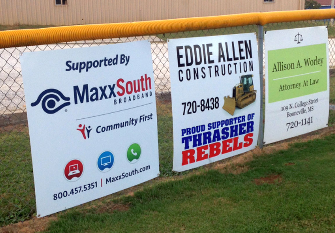 sponsorship banners at a baseball field