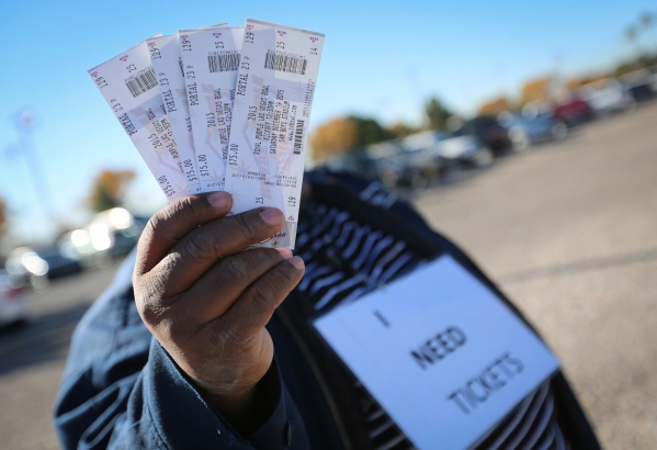 an scalper selling tickets