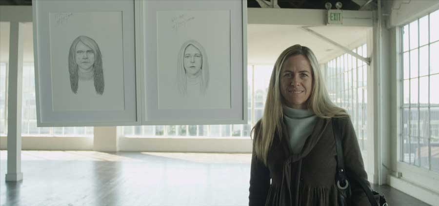 a woman standing on the right side and the two sketches of the woman's face on the left
