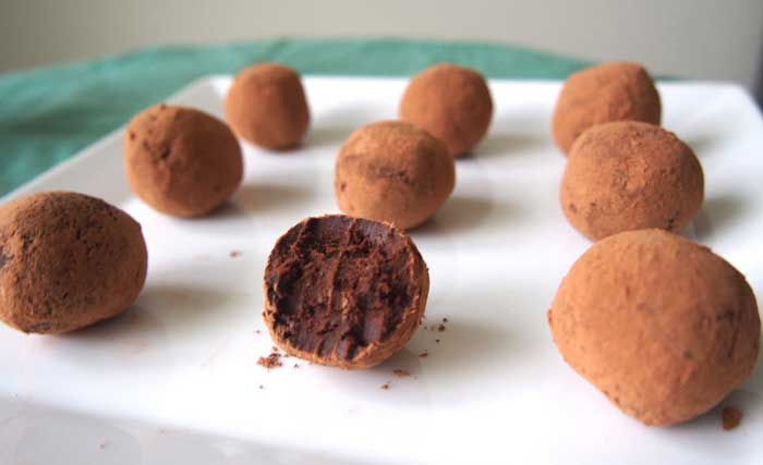 a plate of vegan chocolate balls