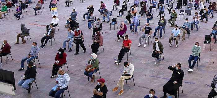people measures social distancing and sitting far apart