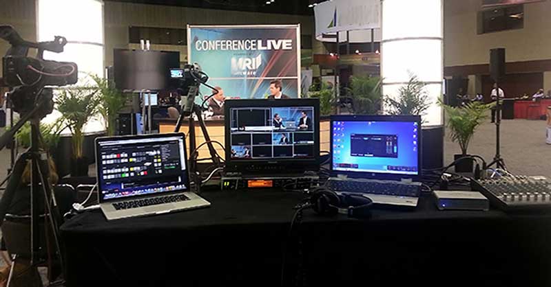 laptop and video equipment on a desk