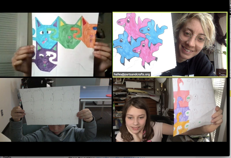 students showing their artwork using Zoom