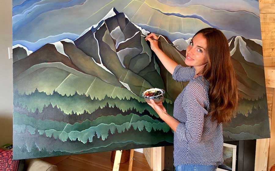 a-woman-painting-mountains