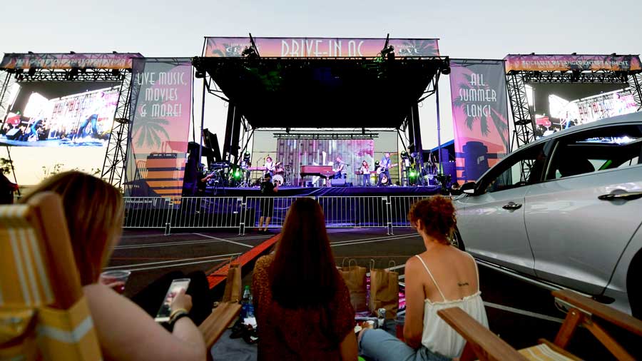 people-parked-in-their-cars-watching-a-performance