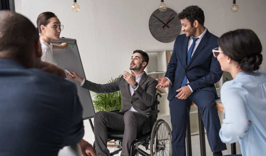 a-guy-talking-in-a-wheelchair