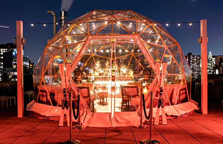 a-seating-dome-with-red-lights-on-it
