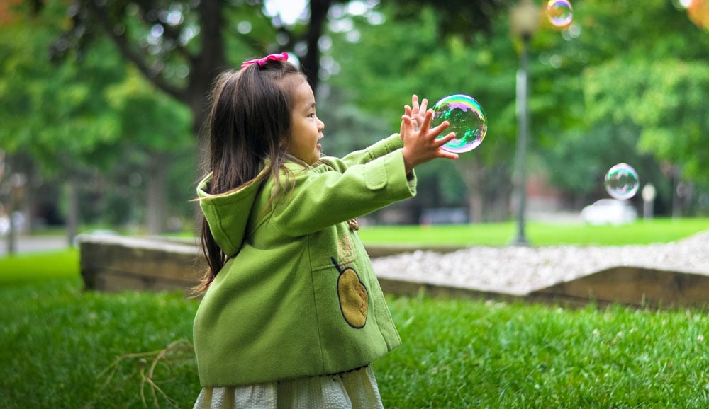 a-girl-playing-in-the-park